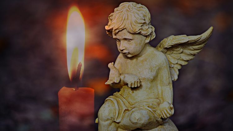 Ангел и свеча. Фото: pixabay