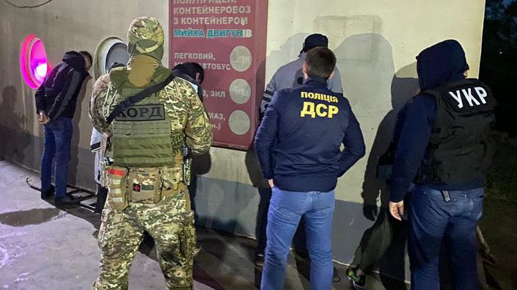Захват киллеров, которые пытались убить главу балканского наркокартеля в Киеве. Фото Нацполиции