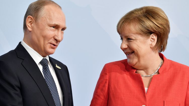 Владимир Путин и Ангела Меркель практически согласовали позицию по введению миротворцев на Донбасс. Фото: rbk.ru